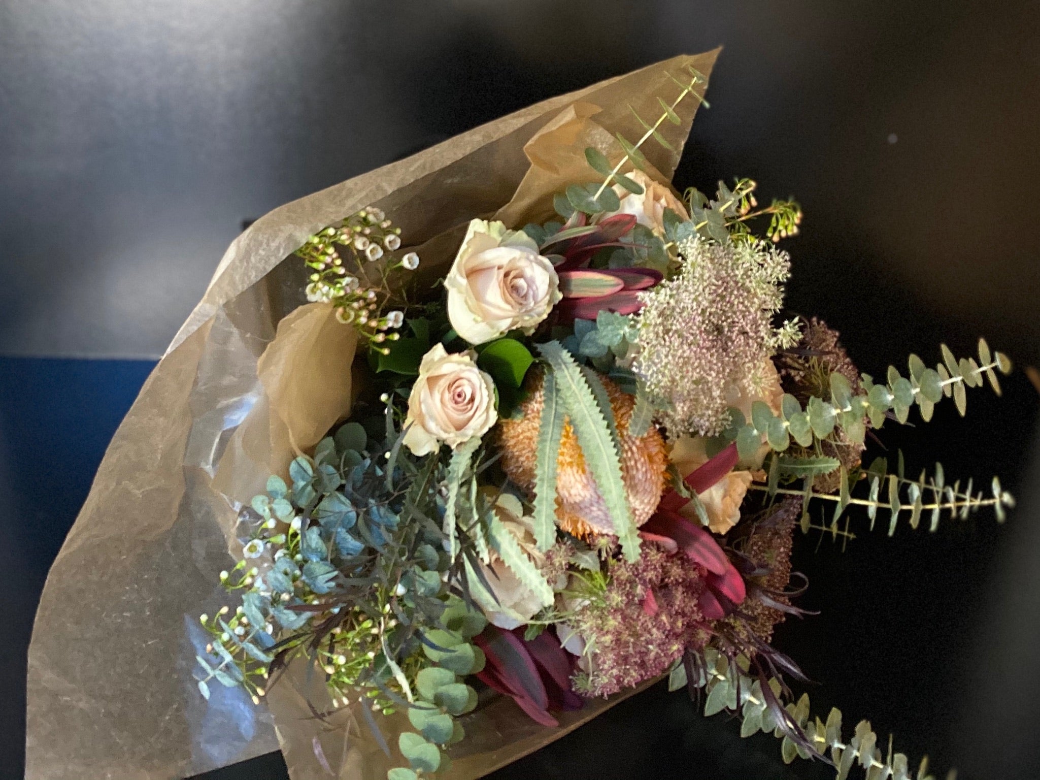 HAND-WRAPPED BOUQUET ACME FLORAL CO.