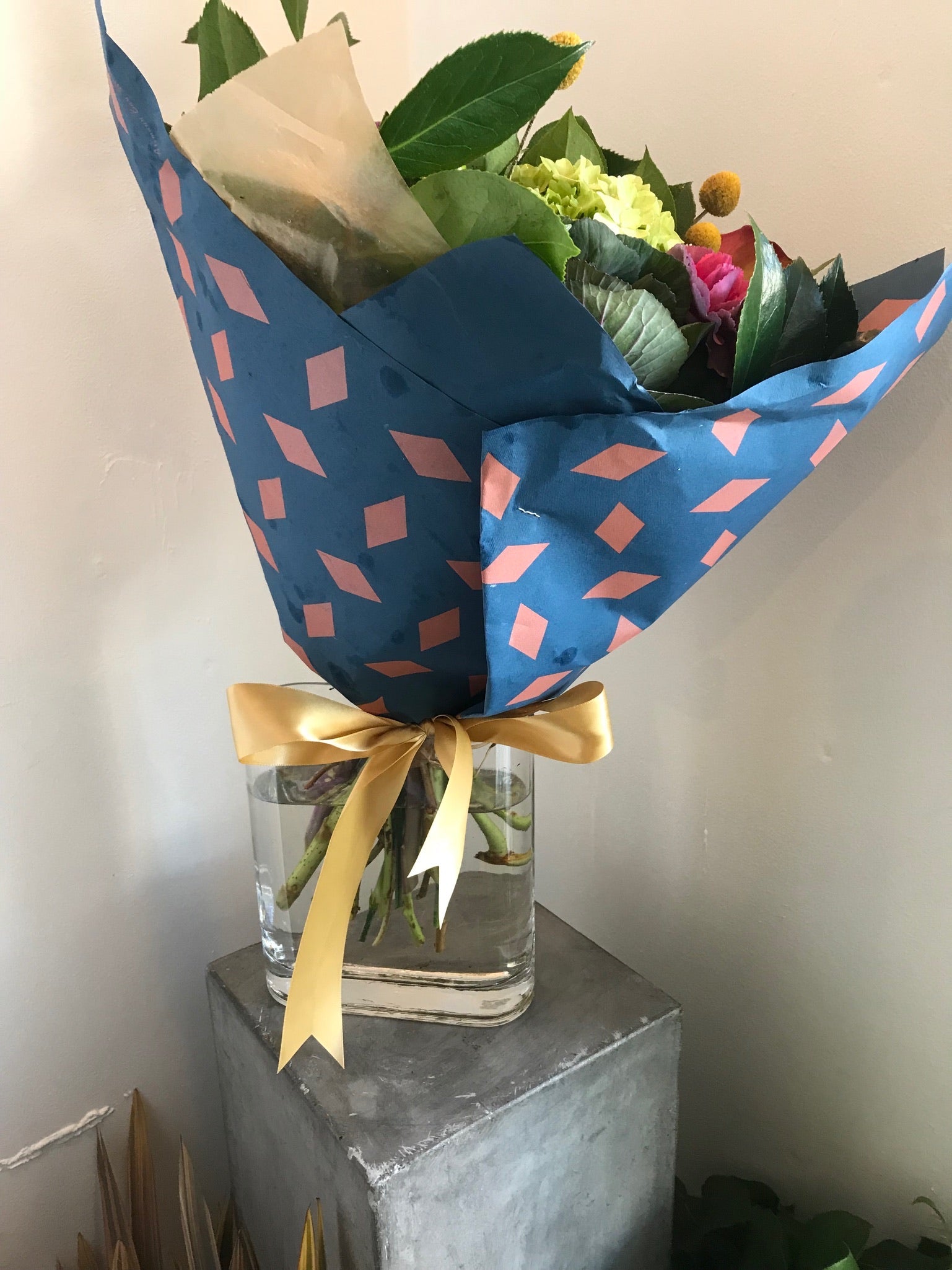 HAND-WRAPPED BOUQUET ACME FLORAL CO.
