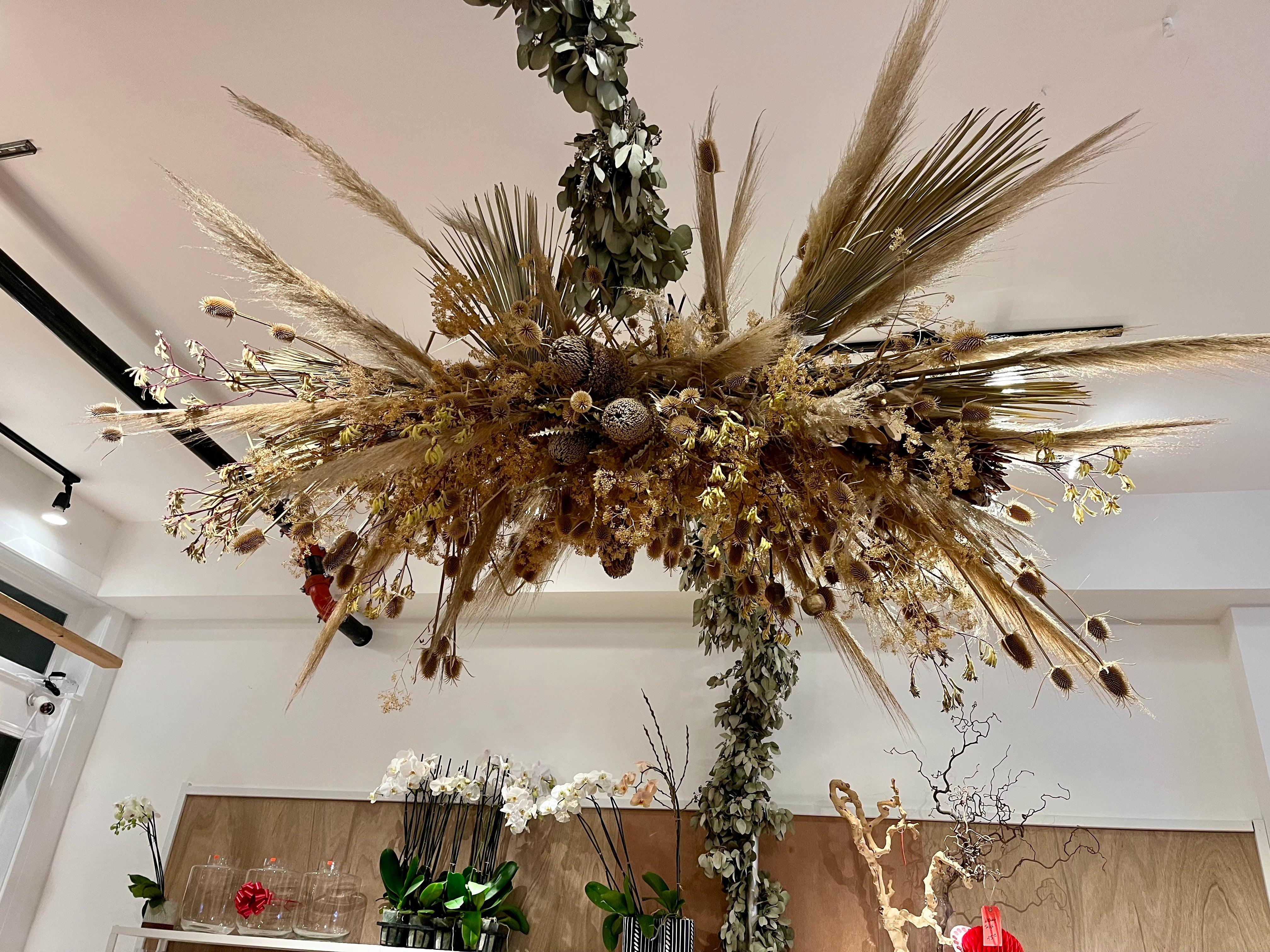 SUSPENDED FLORAL ACME FLORAL CO.