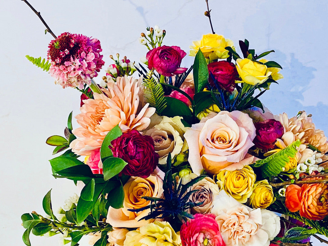 HAND-WRAPPED BOUQUET ACME FLORAL CO.