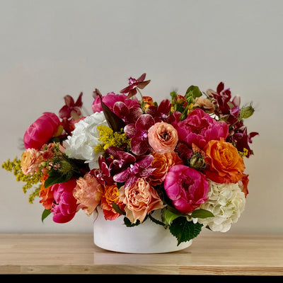 Peony, Ranunculus, orchids, roses, garden roses, hydrangea flower centerpiece... great touches custom same day delivery