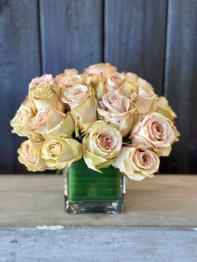 these roses are favorites for a reason. Full Blown nuance and rich tones, mauve, pink tan, green, ruffled edges. the bomb dot com